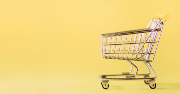 shopping cart with yellow background