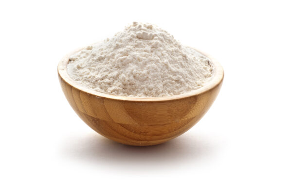 yeast beta glucan powder in wood bowl